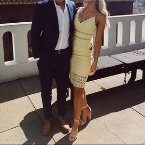 Yellow lace knee length dress